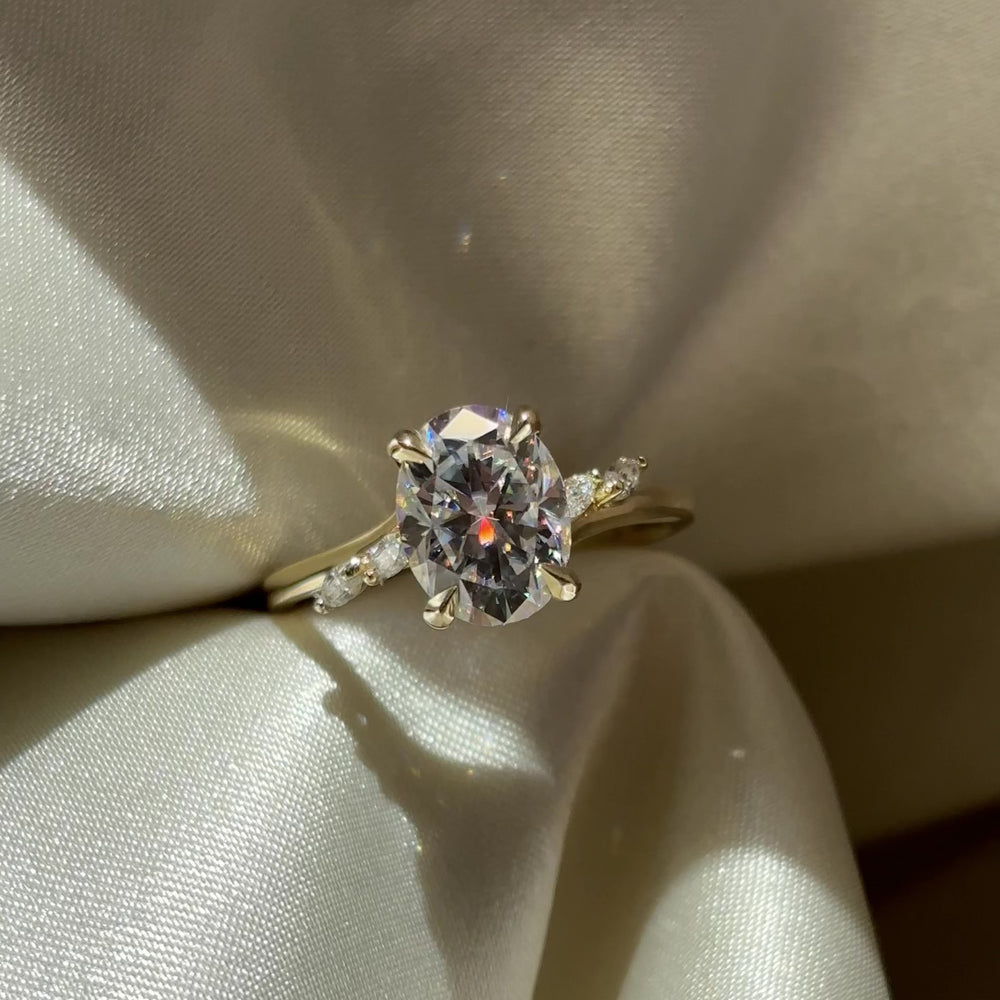 
                      
                        Load and play video in Gallery viewer, The Amira Ring - 2.1ct Moissanite Oval with Marquise Accents
                      
                    