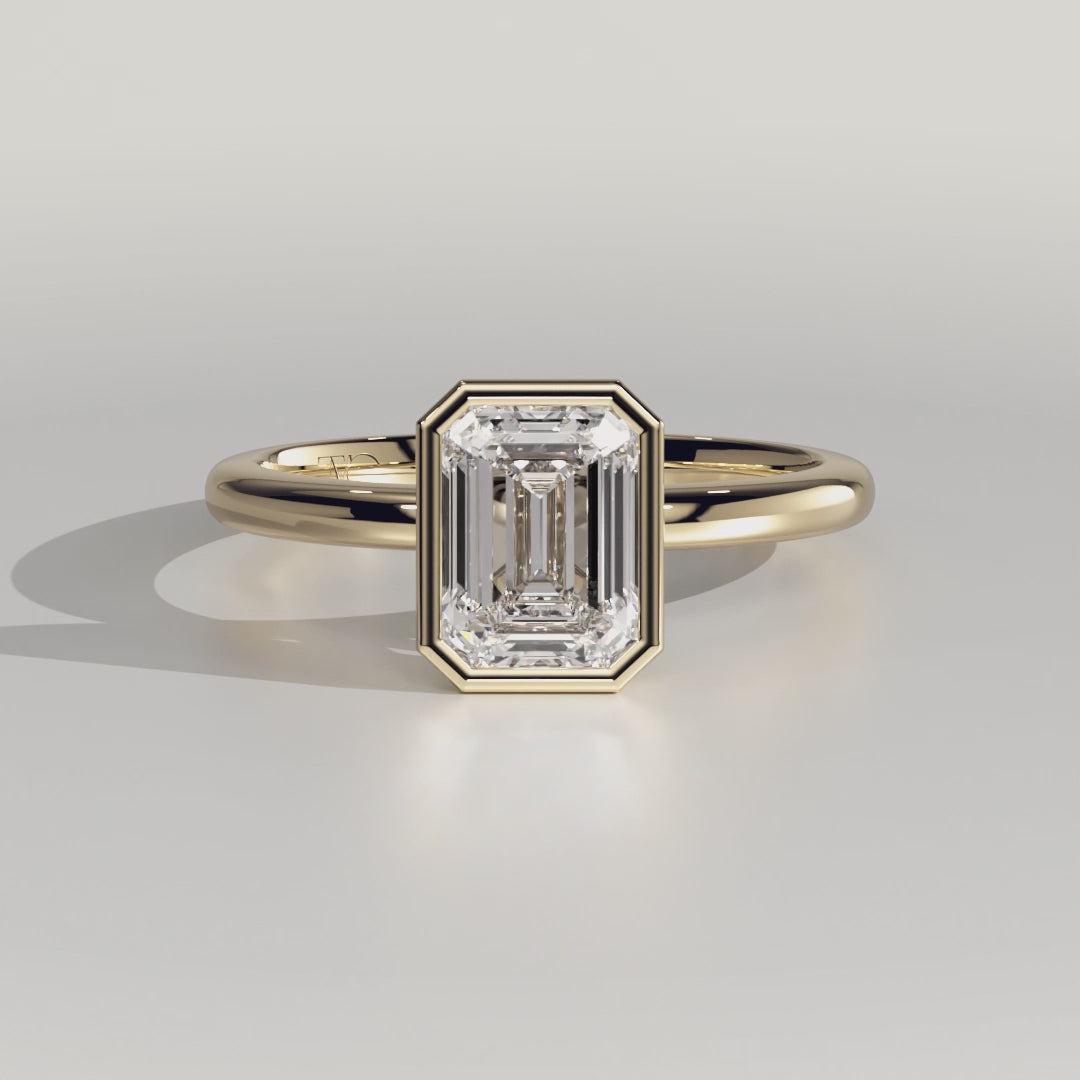 The Audrey Ring - Emerald Bezel Solitaire