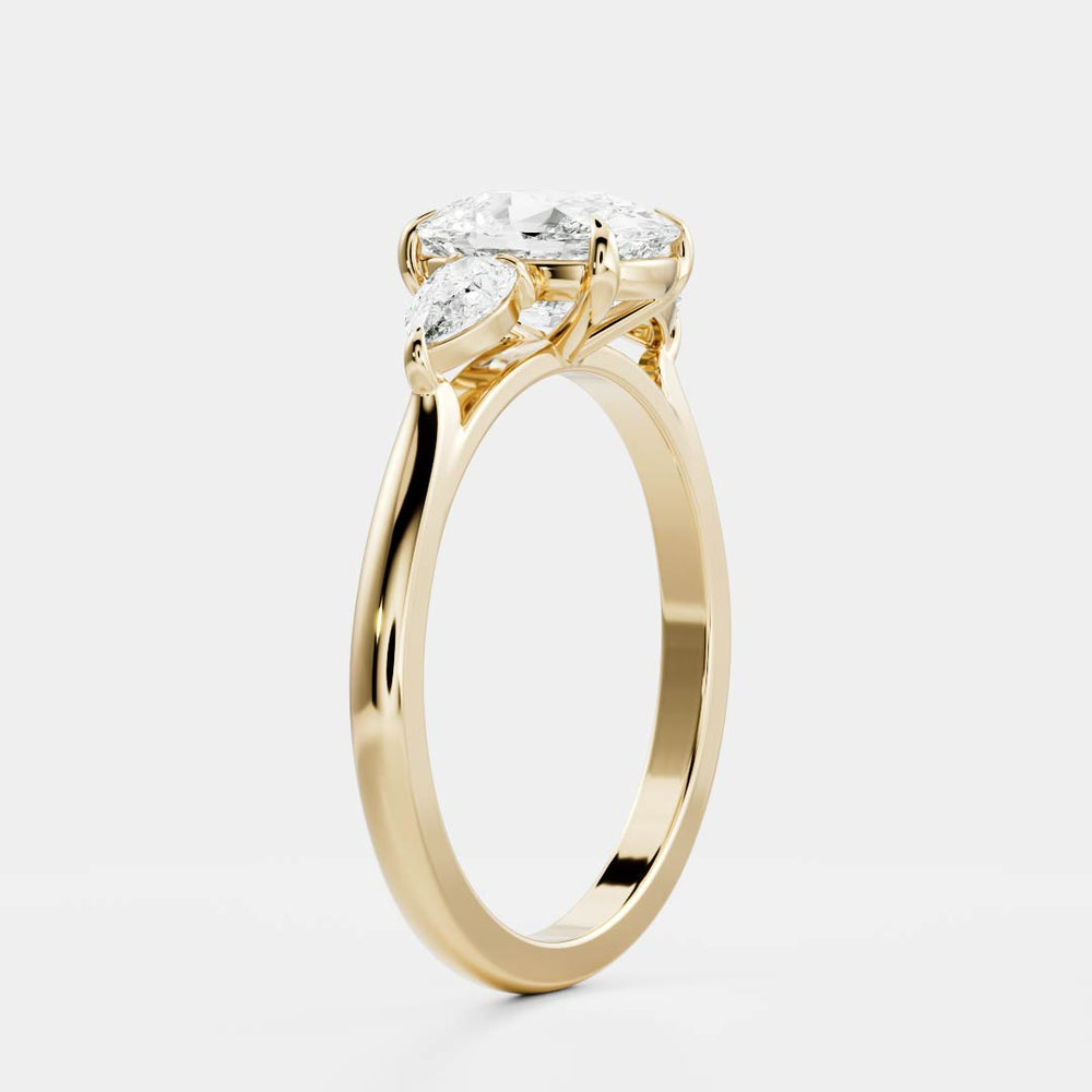 
                      
                        The Florence Ring - Elongated Cushion & Pear Trilogy
                      
                    